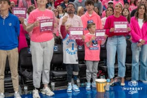 Creighton Bluejay fan stands during the pink out ceremony during a college basketball game against UCONN on Jan 31, 2026, in Omaha, Nebraska. Photo by Brandon Tiedemann