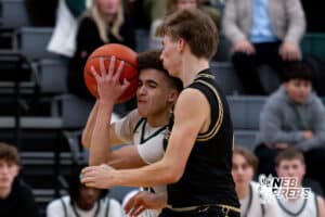 Lincoln Southwest guard Makkiah Sanders (10) tries to push past Lincoln Southeast defender Carter Chatelain (2) during a high school basketball game, Thursday, Jan. 29, 2026, Lincoln, Nebraska. Photo by Braden Cochran.