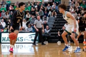 Lincoln Southeast point guard Rowan Lambert (0) moves to the three-point line against Lincoln Southwest silverhawk Uzziah Sanders (2), during a high school basketball game, Thursday, Jan. 29, 2026, Lincoln, Nebraska. Photo by Braden Cochran.