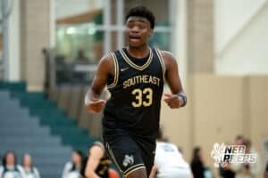 Lincoln Southwest player Prospedi Mukendi (33) celebrates after a point against Lincoln Southwest during a high school basketball game, Thursday, Jan. 29, 2026, Lincoln, Nebraska. Photo by Braden Cochran.