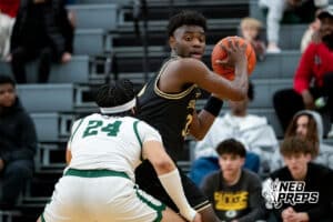 Lincoln Southeast power forward Prospedi Mukendi (33) holds the ball away from Lincoln Southwest defender Kobi Kerr (24) during a high school basketball game, Thursday, Jan. 29, 2026, Lincoln, Nebraska. Photo by Braden Cochran.