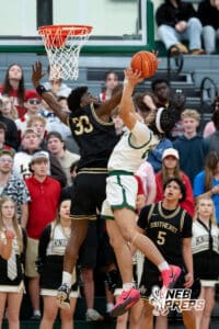 Lincoln Southeast Knight Prospedi Mukendi (33) swats a lay up from Lincoln Southwest Silverhawk Kobi Kerr (24) during a high school basketball game, Thursday, Jan. 29, 2026, Lincoln, Nebraska. Photo by Braden Cochran.