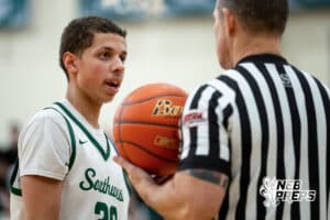 Lincoln Southwest Silverhawk Dakari Wilson (3) talks with the referee before in bounding the ball agaisnt Lincoln Southeast during a high school basketball game, Thursday, Jan. 29, 2026, Lincoln, Nebraska. Photo by Braden Cochran.