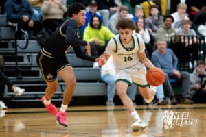 Lincoln Southwest Silverhawk Makkiah Sanders (10) dribbles around Lincoln Southeast Knight Rowan Lambert (0) during a high school basketball game, Thursday, Jan. 29, 2026, Lincoln, Nebraska. Photo by Braden Cochran.