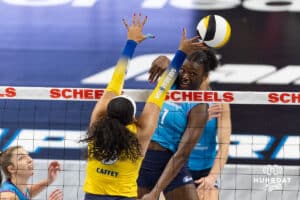 Omaha Supernovas Toyosi Onabanjo (21) spikes the ball against San Diego Mojo Kayla Caffey (5) in the fourth set during a professional volleyball match Friday, Jan. 30, 2026, in Omaha, Nebraska. Photo by John S. Peterson.