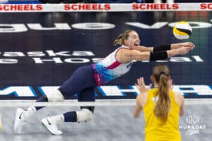 Omaha Supernovas Morgan Hentz (9) dives to make a dig against the San Diego Mojo in the third set during a professional volleyball match Friday, Jan. 30, 2026, in Omaha, Nebraska. Photo by John S. Peterson.