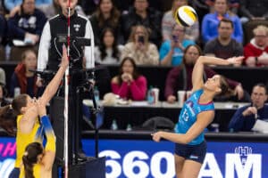 Omaha Supernovas Merritt Beason (13) spikes the ball against the San Diego Mojo in the second set during a professional volleyball match Friday, Jan. 30, 2026, in Omaha, Nebraska. Photo by John S. Peterson.