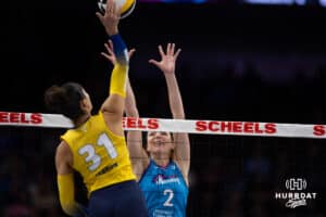 Omaha Supernovas Sydney Hilley (2) jumps to block a spike from San Diego Mojo Maya Tabron (31) in the first set during a professional volleyball match Friday, Jan. 30, 2026, in Omaha, Nebraska. Photo by John S. Peterson.