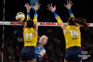 Omaha Supernovas Emily Londot (27) spikes the ball against San Diego Mojo Maya Tabron (31) and McKenna Vicini (14) in the first set during a professional volleyball match Friday, Jan. 30, 2026, in Omaha, Nebraska. Photo by John S. Peterson.