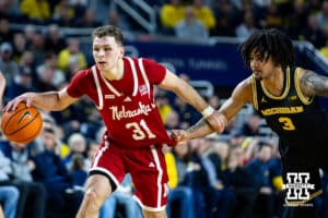 Nebraska Cornhusker guard Cale Jacobsen (31) dribbles the basketball as Michigan Wolverine guard Elliot Cadeau (3) holds his jersey during a college men’s basketball game Tuesday, Jan. 27, 2026, in Ann Arbor, Michigan. Photo by John S. Peterson.