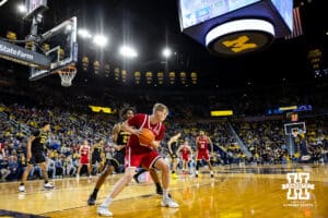 Nebraska Cornhusker forward Leo Curtis (33) ready to make a move on Michigan Wolverine forward Morez Johnson Jr. (21) in the second half during a college men’s basketball game Tuesday, Jan. 27, 2026, in Ann Arbor, Michigan. Photo by John S. Peterson.