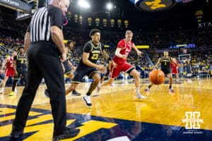 Nebraska Cornhusker forward Leo Curtis (33) and Michigan Wolverine forward Yaxel Lendeborg (23) chase after a loose ball in the second half during a college men’s basketball game Tuesday, Jan. 27, 2026, in Ann Arbor, Michigan. Photo by John S. Peterson.