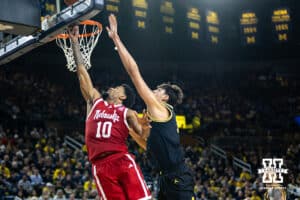 Nebraska Cornhusker guard Jamarques Lawrence (10) makes a lay up against Michigan Wolverine center Aday Mara (15) in the second half during a college men’s basketball game Tuesday, Jan. 27, 2026, in Ann Arbor, Michigan. Photo by John S. Peterson.