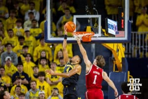 Nebraska Cornhusker guard Sam Hoiberg (1) tries to block Michigan Wolverine guard Nimari Burnett (4) in the first half during a college men’s basketball game Tuesday, Jan. 27, 2026, in Ann Arbor, Michigan. Photo by John S. Peterson.