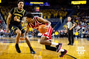 Nebraska Cornhusker guard Jamarques Lawrence (10) drives to the basket against Michigan Wolverine forward Yaxel Lendeborg (23) in the first half during a college men’s basketball game Tuesday, Jan. 27, 2026, in Ann Arbor, Michigan. Photo by John S. Peterson.