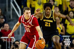Nebraska Cornhusker guard Cale Jacobsen (31) dribbles the balldown the court against Michigan Wolverine forward Morez Johnson Jr. (21) in the first half during a college men’s basketball game Tuesday, Jan. 27, 2026, in Ann Arbor, Michigan. Photo by John S. Peterson.