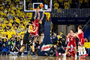 Nebraska Cornhusker forward Jared Garcia (15) gets shoved by Michigan Wolverine center Aday Mara (15) while trying to block a shot during a college men’s basketball game Tuesday, Jan. 27, 2026, in Ann Arbor, Michigan. Photo by John S. Peterson.