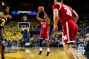 Nebraska Cornhusker guard Jamarques Lawrence (10) makes a three point basket against the Michigan Wolverines in the first half during a college men’s basketball game Tuesday, Jan. 27, 2026, in Ann Arbor, Michigan. Photo by John S. Peterson.