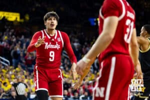 Nebraska Cornhusker forward Berke Büyüktuncel (9) talks to guard Cale Jacobsen (31) during a college men’s basketball game against the Michigan Wolverines Tuesday, Jan. 27, 2026, in Ann Arbor, Michigan. Photo by John S. Peterson.