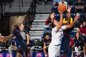 Creighton Bluejay Grace Boffeli (42) shoots over a defender during a college basketball game against St. John’s on Jan 28, 2026, in Omaha, Nebraska. Photo by Brandon Tiedemann