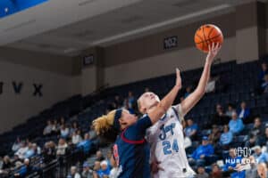 Creighton Bluejay Ava Zediker (24) shoots over a Shaulana Wagner (8) during a college basketball game against St. John’s on Jan 28, 2026, in Omaha, Nebraska. Photo by Brandon Tiedemann