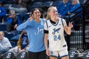 Creighton Bluejays Kiani Lockett (11) and Ava Zediker (24) pose together during a college basketball game against St. John’s on Jan 28, 2026, in Omaha, Nebraska. Photo by Brandon Tiedemann