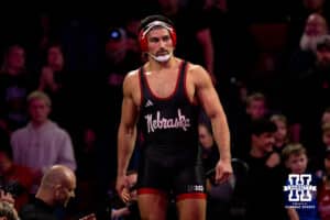 At heavweight, Nebraska Cornhusker AJ Ferrari walks onto the mat before his bout with Ohio State Buskeye Nick Fiedman during a college wrestling dual Sunday, Jan. 25, 2026, Lincoln, Nebraska. Photo by Braden Cochran.