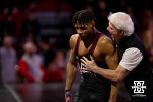 Nebraska head coach Mark Manning passionatly celebrates a win with Christopher Minto after his match during a college wrestling dual Sunday, Jan. 25, 2026, Lincoln, Nebraska. Photo by Braden Cochran.
