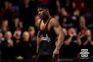 At 174, Nebraska Wrestler Christopher Minto walks off the mat back to the bench during a college wrestling dual Sunday, Jan. 25, 2026, Lincoln, Nebraska. Photo by Braden Cochran.
