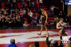 At 174, Nebraska wrestler Christopher Minto walks away from his beaten Ohio State opponent Carson Karchla during a college wrestling dual Sunday, Jan. 25, 2026, Lincoln, Nebraska. Photo by Braden Cochran.