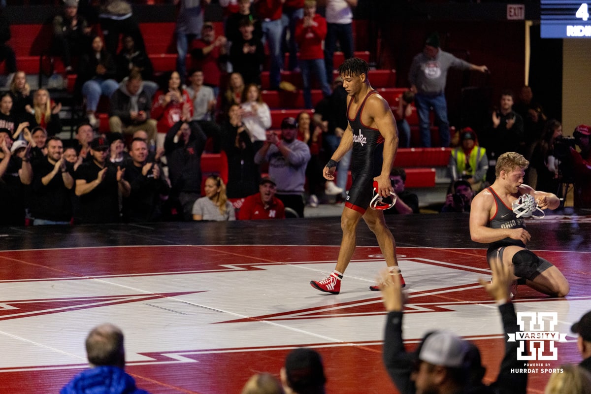 At 174, Nebraska wrestler Christopher Minto walks away from his beaten Ohio State opponent Carson Karchla during a college wrestling dual Sunday, Jan. 25, 2026, Lincoln, Nebraska. Photo by Braden Cochran.