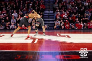 At 174, Nebraska Cornhusker Christopher Minto and Ohio State Buckeye Carson Kharchla contest each other towards the middle of the mat during a college wrestling dual Sunday, Jan. 25, 2026, Lincoln, Nebraska. Photo by Braden Cochran.