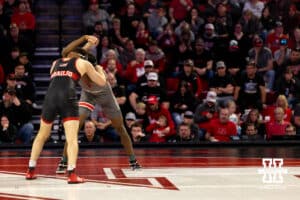 At 165, Nebraska wrestler LJ Arujo and Ohio State Buckeye e'Than Birden contest each other at the middle of the mat during a college wrestling dual Sunday, Jan. 25, 2026, Lincoln, Nebraska. Photo by Braden Cochran.