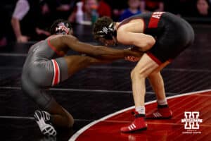 At 165, Nebraska Cornhusker LJ Arujo tries to pull Ohio State Buckey e'Than Brian back into the circle during a college wrestling dual Sunday, Jan. 25, 2026, Lincoln, Nebraska. Photo by Braden Cochran.