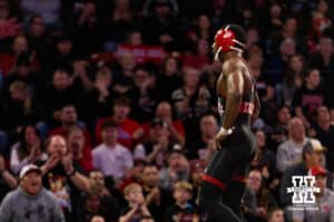 At 157, Nebraska Cornhusker Antrell Taylor walks back to the Husker bench with a cheering crowd behind him during a college wrestling dual Sunday, Jan. 25, 2026, Lincoln, Nebraska. Photo by Braden Cochran.