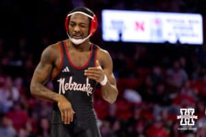 At 157, Nebraska Cornhusker Antrell Taylor is poked in the eye for the second time in the first round by Ohio State Buckeye Maddox Shaw during a college wrestling dual Sunday, Jan. 25, 2026, Lincoln, Nebraska. Photo by Braden Cochran.