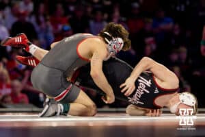 At 125, Nebraska wrestler Kael Lauridsen straightens his body against Ohio State wrestler Nic Bouzakis during a college wrestling dual Sunday, Jan. 25, 2026, Lincoln, Nebraska. Photo by Braden Cochran.