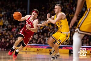 Nebraska Cornhusker guard Sam Hoiberg (1) drives to the basket against Minnesota Golden Gopher guard Maximus Gizzi (11) in the second half during a college men’s basketball game on Saturday, Jan. 24, 2026, in Minneapolis, Minnesota. Photo by John S. Peterson.
