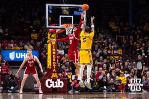 Nebraska Cornhusker forward Berke Büyüktuncel (9) blocks a shot from Minnesota Golden Gopher forward Jaylen Crocker-Johnson (5) in the second half during a college men’s basketball game on Saturday, Jan. 24, 2026, in Minneapolis, Minnesota. Photo by John S. Peterson.
