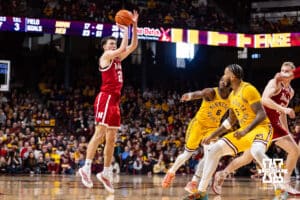Nebraska Cornhusker forward Pryce Sandfort (21) makes a three point shot against the Minnesota Golden Gophers in the second half during a college men’s basketball game on Saturday, Jan. 24, 2026, in Minneapolis, Minnesota. Photo by John S. Peterson.