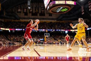 Nebraska Cornhusker guard Cale Jacobsen (31) makes a three point shot against Minnesota Golden Gopher forward Cade Tyson (10) in the second half during a college men’s basketball game on Saturday, Jan. 24, 2026, in Minneapolis, Minnesota. Photo by John S. Peterson.