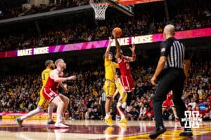 Nebraska Cornhusker guard Jamarques Lawrence (10) makes a lay up against Minnesota Golden Gopher guard Kai Shinholster (9) in the second half during a college men’s basketball game on Saturday, Jan. 24, 2026, in Minneapolis, Minnesota. Photo by John S. Peterson.