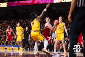 Nebraska Cornhusker forward Pryce Sandfort (21) goes for a lay up against Minnesota Golden Gopher guard Langston Reynolds (6) in the second half during a college men’s basketball game on Saturday, Jan. 24, 2026, in Minneapolis, Minnesota. Photo by John S. Peterson.