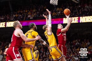 Nebraska Cornhusker guard Cale Jacobsen (31) makes a lay up agianst Minnesota Golden Gopher forward Cade Tyson (10) in the second half during a college men’s basketball game on Saturday, Jan. 24, 2026, in Minneapolis, Minnesota. Photo by John S. Peterson.