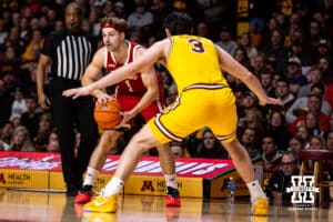 Nebraska Cornhusker guard Sam Hoiberg (1) looks to make a pass against Minnesota Golden Gopher forward Bobby Durkin (3) in the second half during a college men’s basketball game on Saturday, Jan. 24, 2026, in Minneapolis, Minnesota. Photo by John S. Peterson.