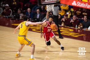 Nebraska Cornhusker guard Jamarques Lawrence (10) dribbles the ball against Minnesota Golden Gopher forward Bobby Durkin (3) in the first half during a college men’s basketball game on Saturday, Jan. 24, 2026, in Minneapolis, Minnesota. Photo by John S. Peterson.