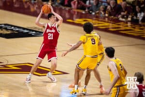 Nebraska Cornhusker forward Pryce Sandfort (21) makes a pass against the Minnesota Golden Gophers during a college men’s basketball game on Saturday, Jan. 24, 2026, in Minneapolis, Minnesota. Photo by John S. Peterson.