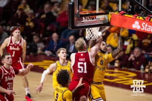 Nebraska Cornhusker forward Rienk Mast (51) reaches for a rebound against Minnesota Golden Gopher forward Jaylen Crocker-Johnson (5) in the first half during a college men’s basketball game Saturday, Jan. 24, 2026, in Minneapolis, Minnesota. Photo by John S. Peterson.