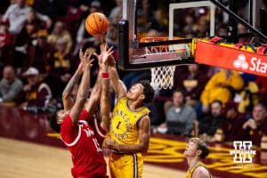 Minnesota Golden Gopher guard Isaac Asuma (1) tips the ball out against Nebraska Cornhusker forward Jared Garcia (15) and guard Jamarques Lawrence (10) in the first half during a college men’s basketball game on Saturday, Jan. 24, 2026, in Minneapolis, Minnesota. Photo by John S. Peterson.