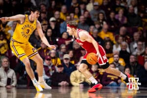 Nebraska Cornhusker guard Sam Hoiberg (1) dribbles the ball against Minnesota Golden Gopher forward Bobby Durkin (3) in the first half during a college men’s basketball game on Saturday, Jan. 24, 2026, in Minneapolis, Minnesota. Photo by John S. Peterson.